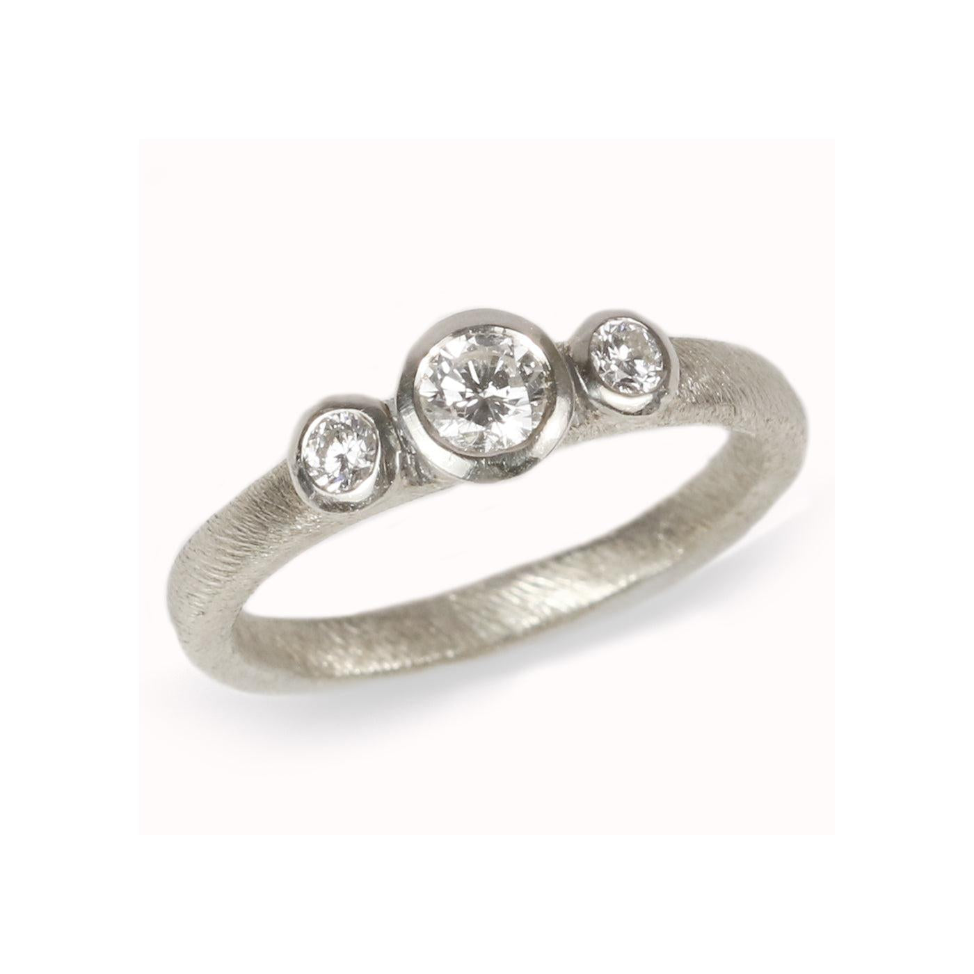 White Gold Diamond Trilogy Ring on white background 