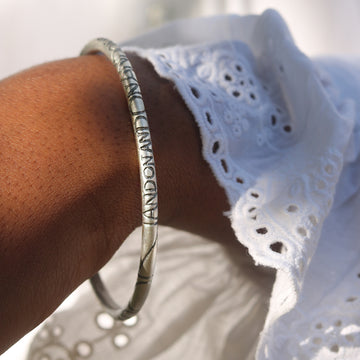 Rounded Silver 'ON AND ON' Bangle