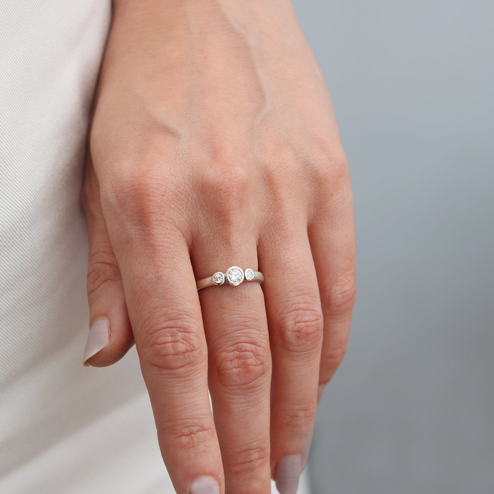 White Gold Diamond Trilogy Ring worn on hand 