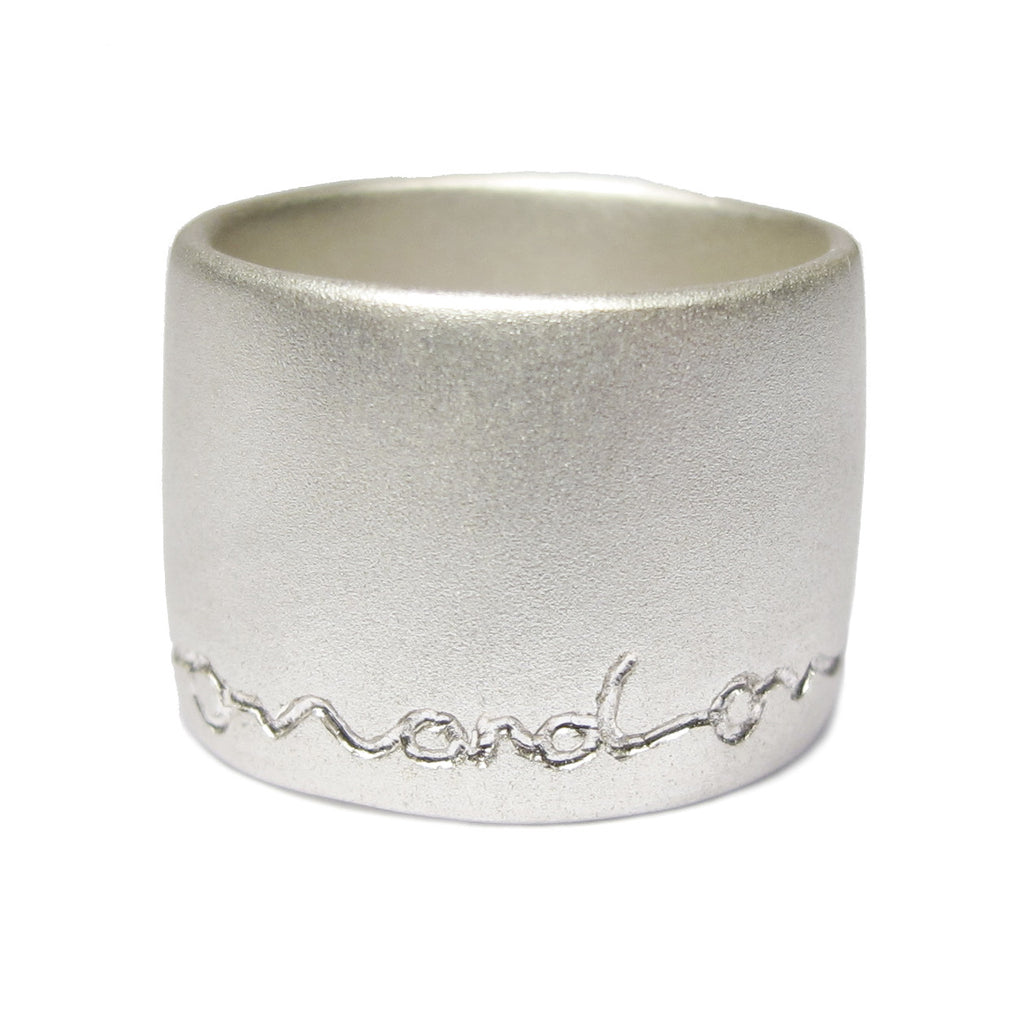 wide silver ring etched on and on by Diana Porter contemporary Jeweller