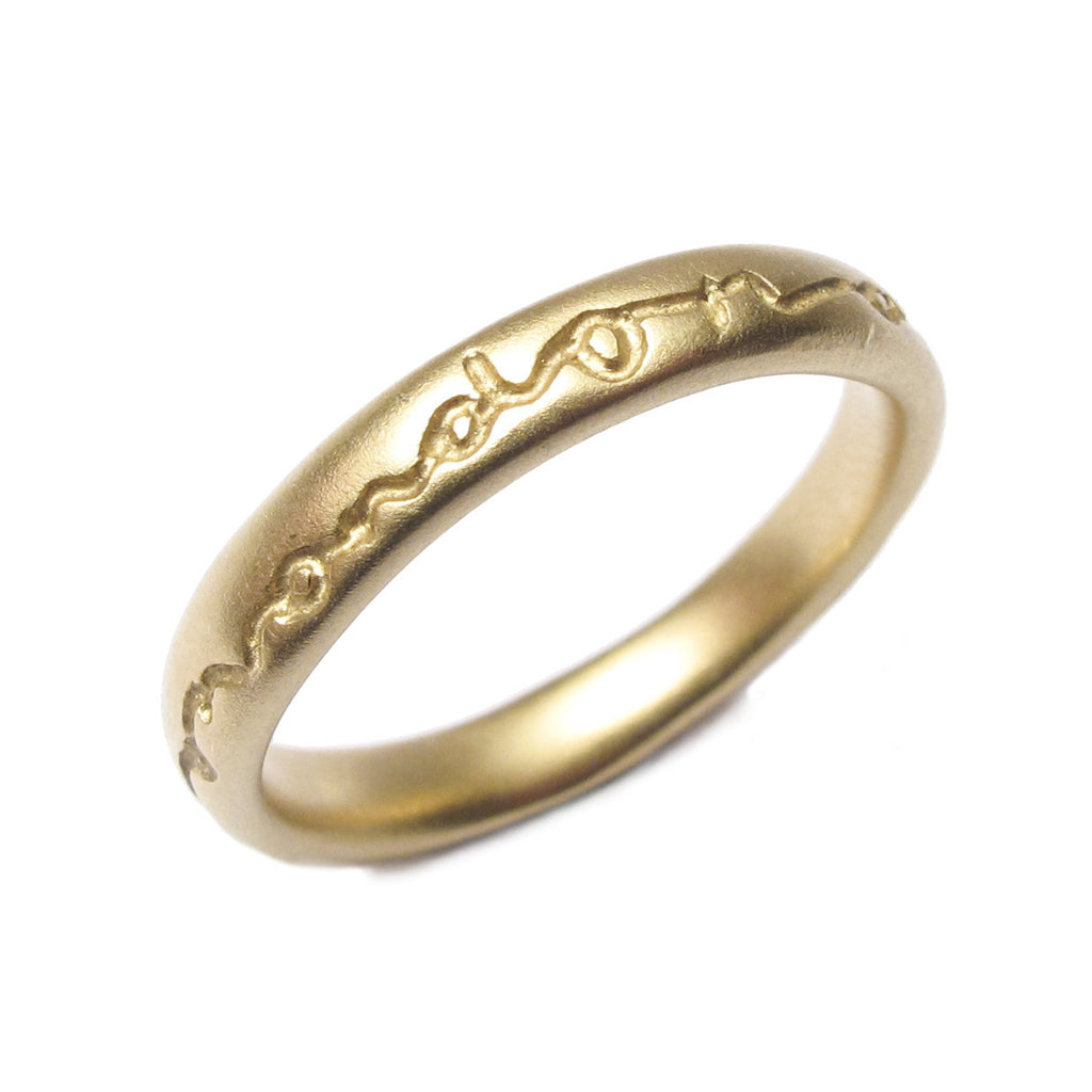 Diana Porter etched yellow gold on and on wedding ring