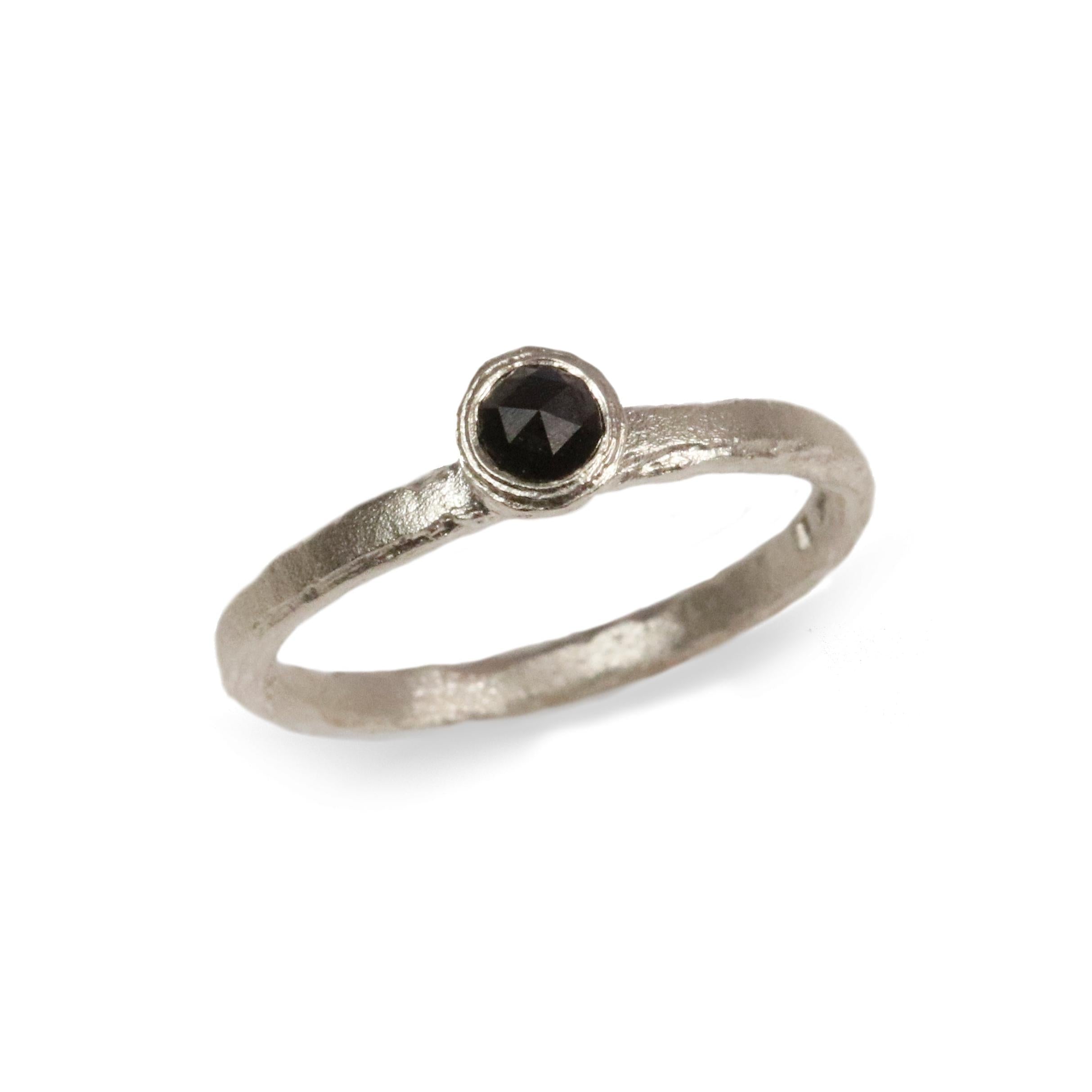 White Gold Ring Set with Black Rose Cut Diamond on white background 