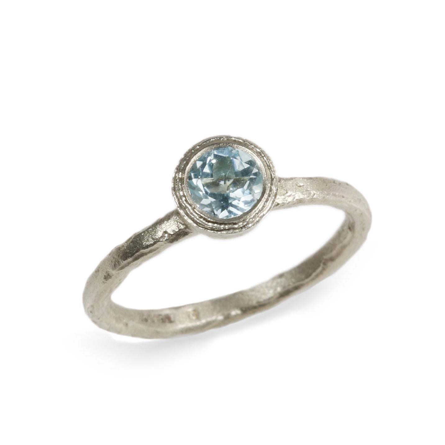 Aquamarine ring in etched 9ct Fairtrade white gold