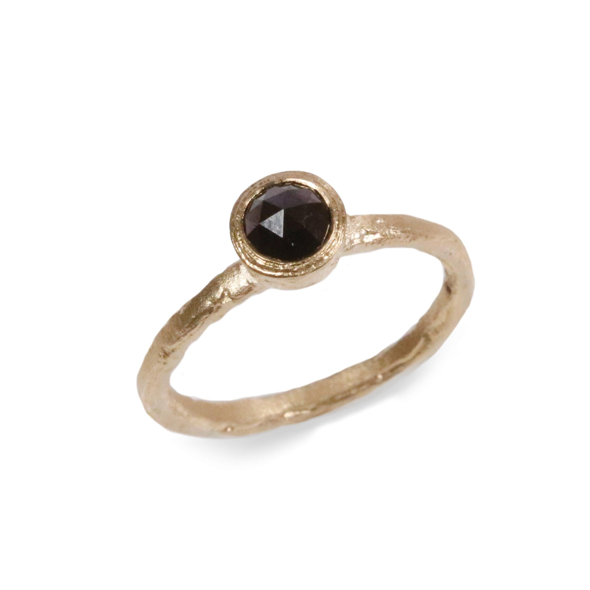 Yellow Gold Solitaire Ring with Black Rose Cut Diamond on white background 