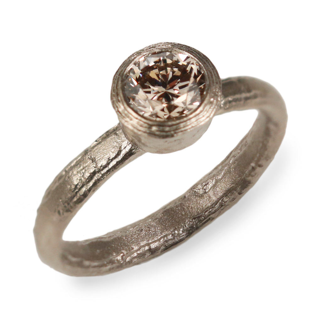 White Gold Ring With Brilliant Cut Champagne Diamond on white background