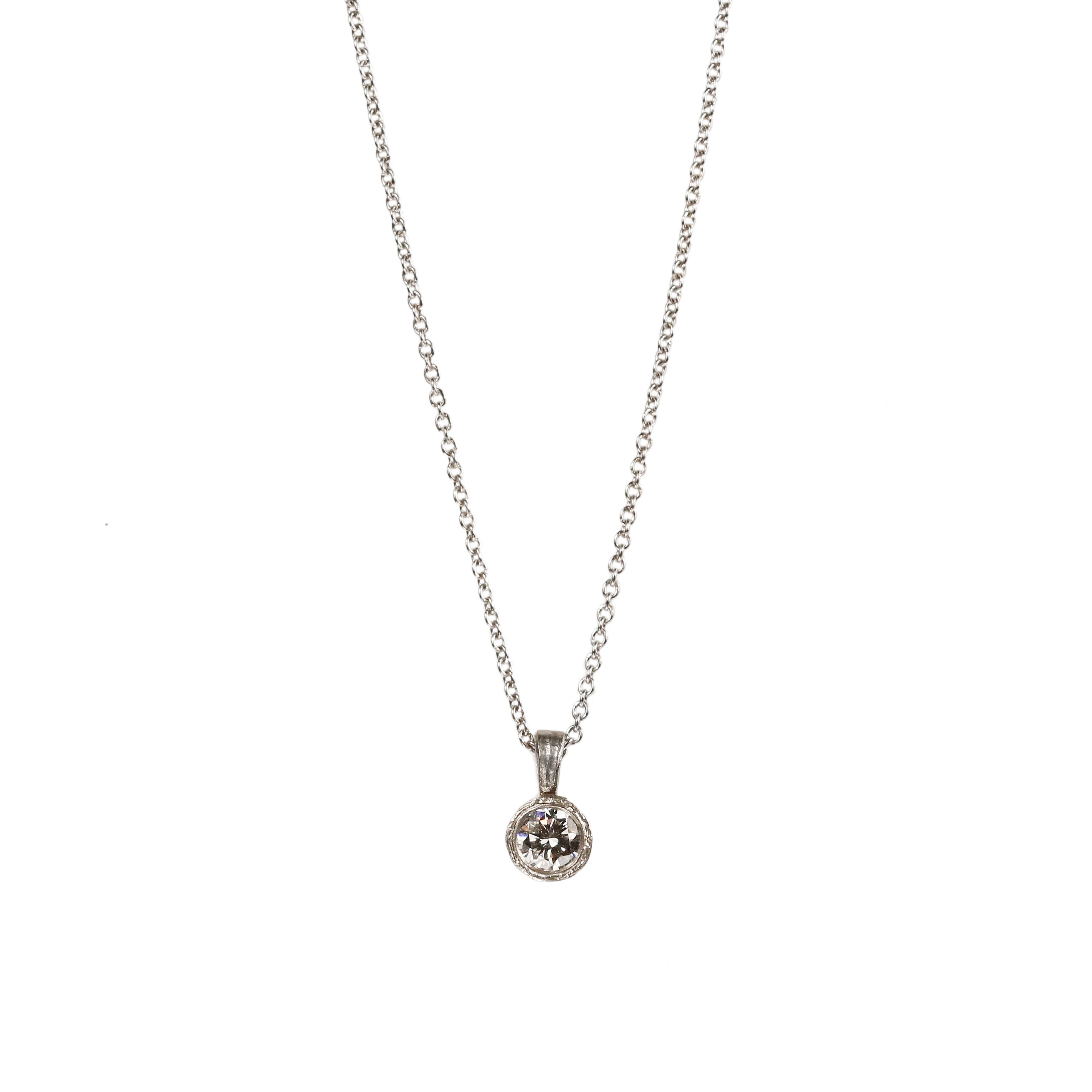 Platinum Etched Pendant Set with a Diamond on Platinum Chain