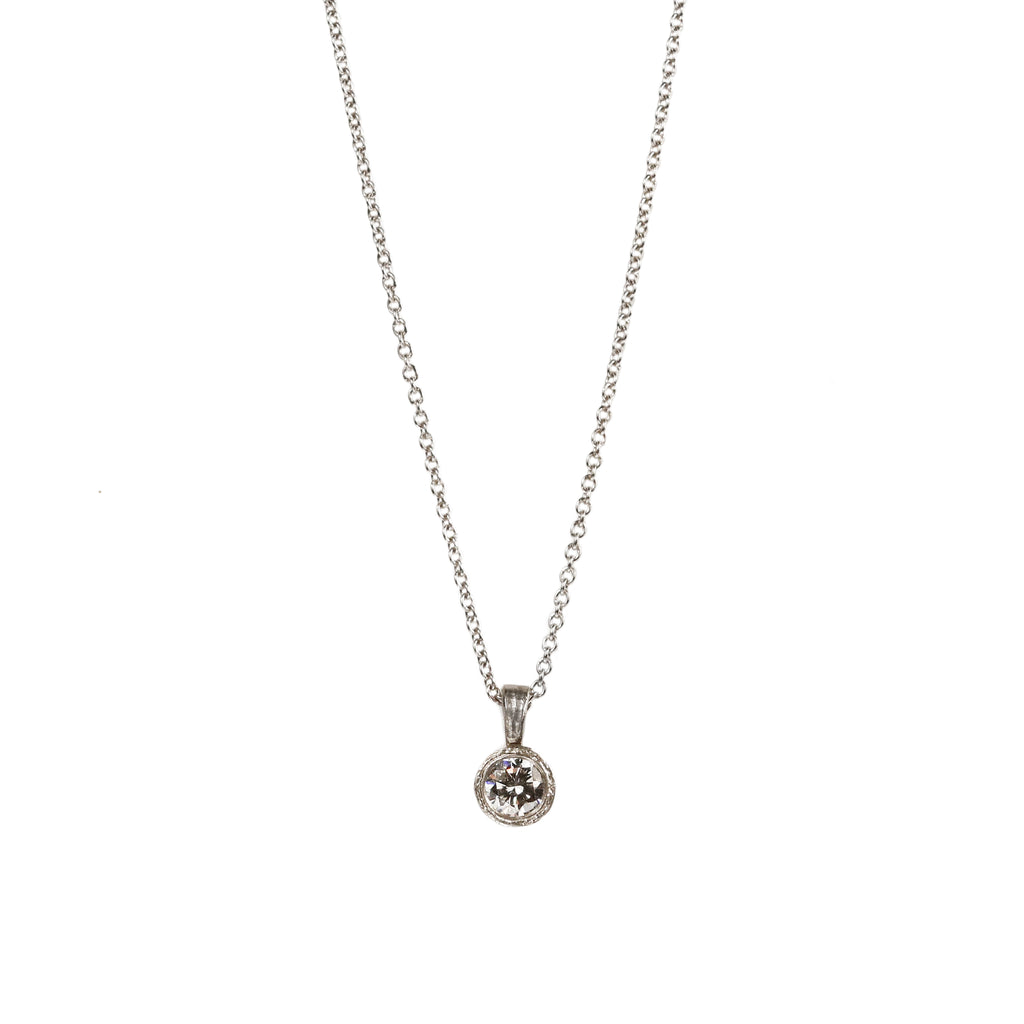 Platinum Etched Pendant Set with a Diamond on Platinum Chain