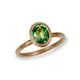 Textured Yellow Gold Ring With a Green Oval Tsavorite Garnet