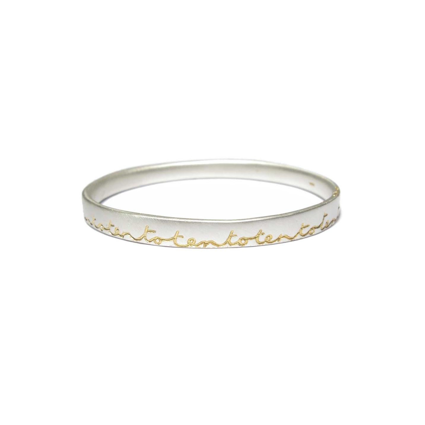 Diana Porter Jewellery bespoke commission etched silver gold bangle
