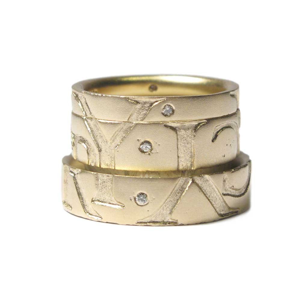 Diana Porter Jewellery bespoke commission etched yellow gold partnership rings