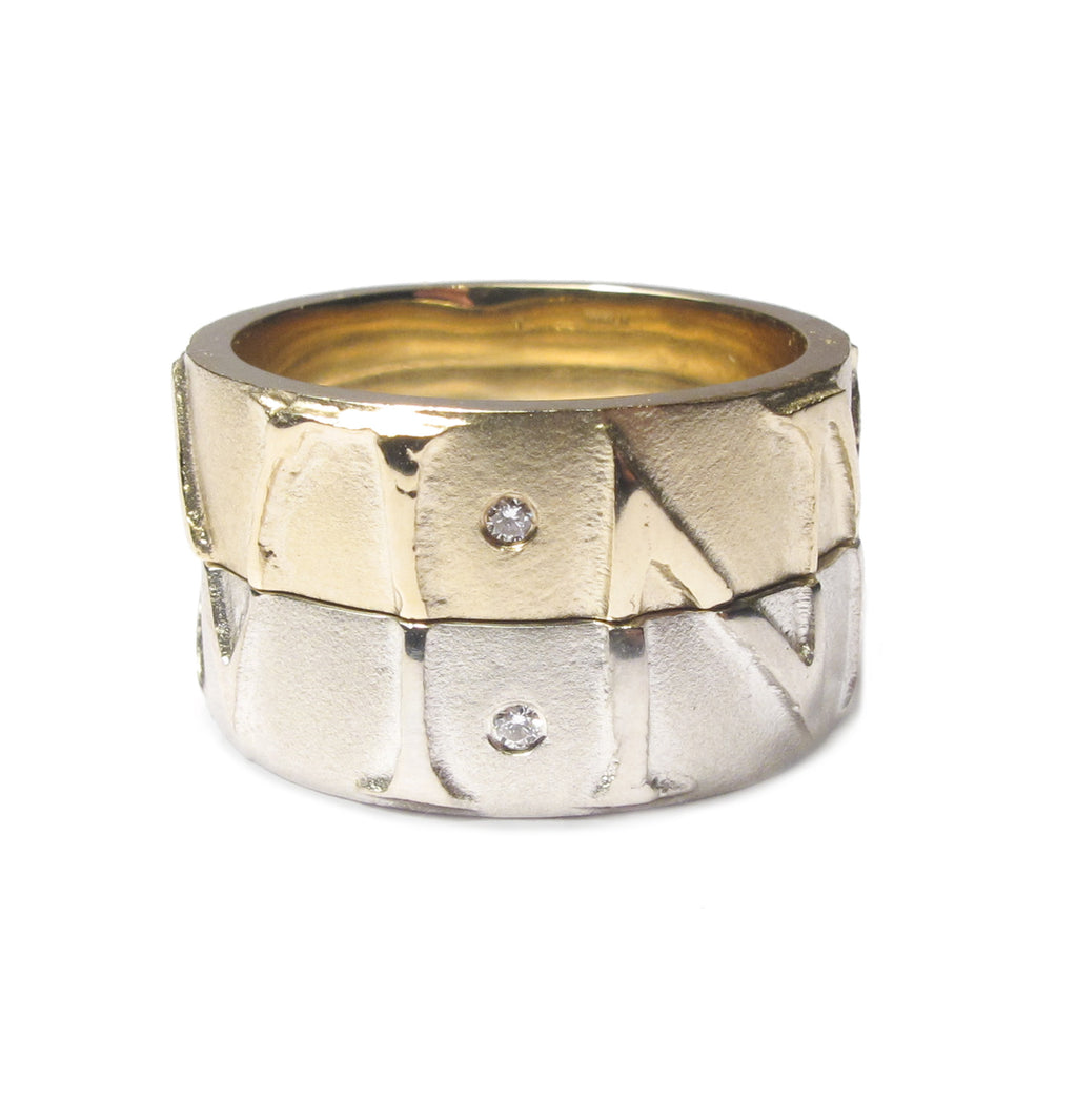 Diana Porter contemporary Jewellery Bespoke partnership rings with commissioned relief etch and diamonds in 9ct white and yellow gold