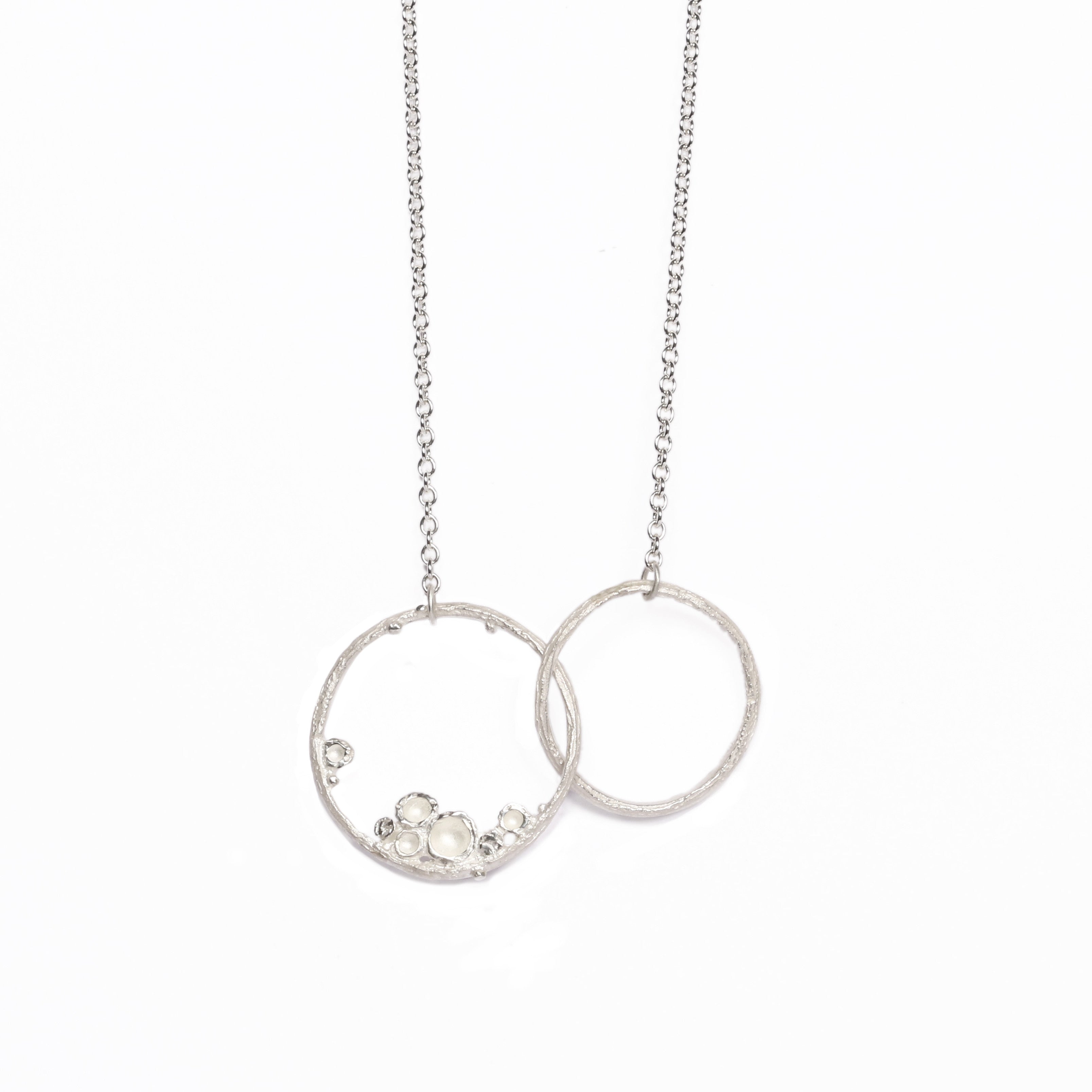 Etched silver Emerge double hoop pendant from Diana Porter's new collection 2017