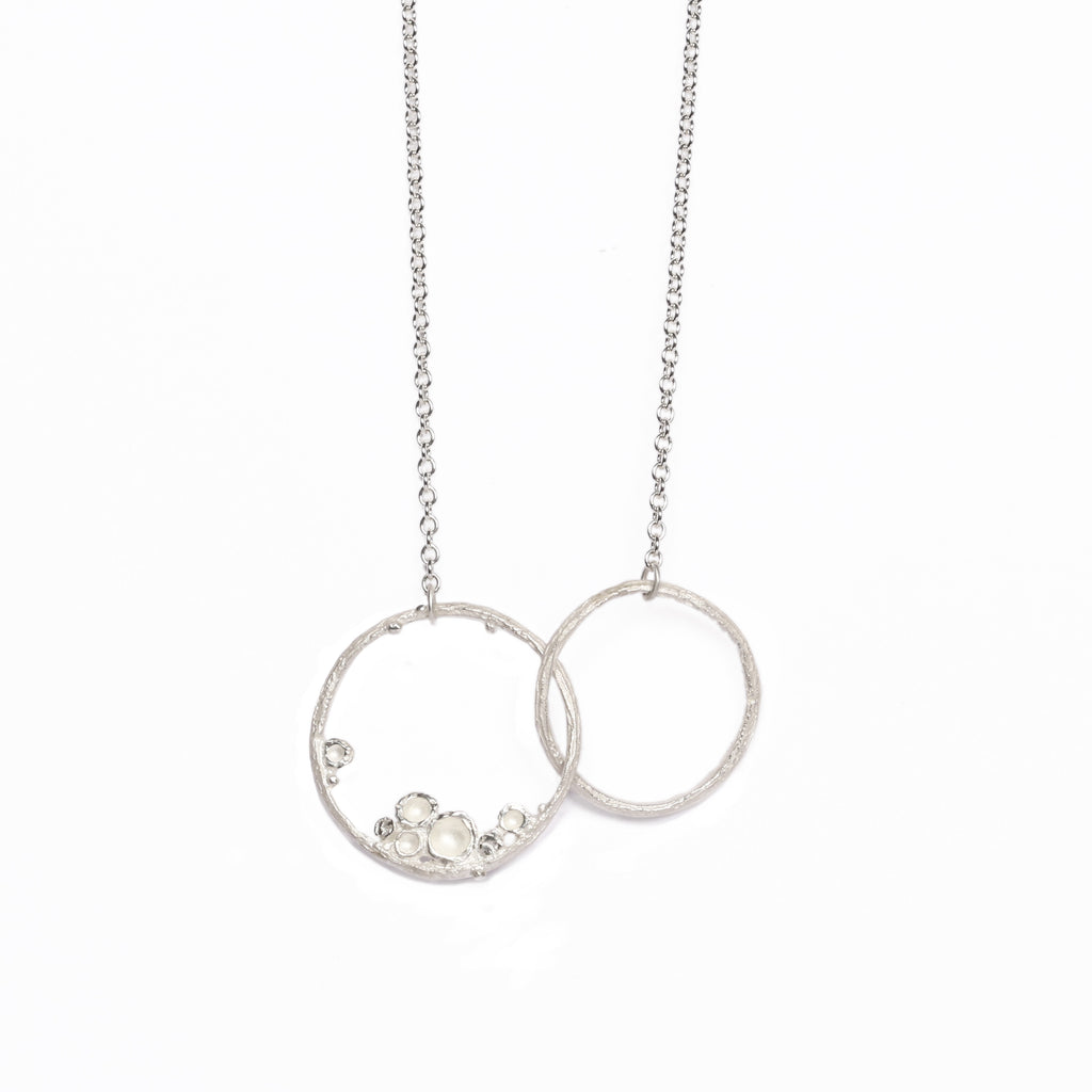 Etched silver Emerge double hoop pendant from Diana Porter's new collection 2017