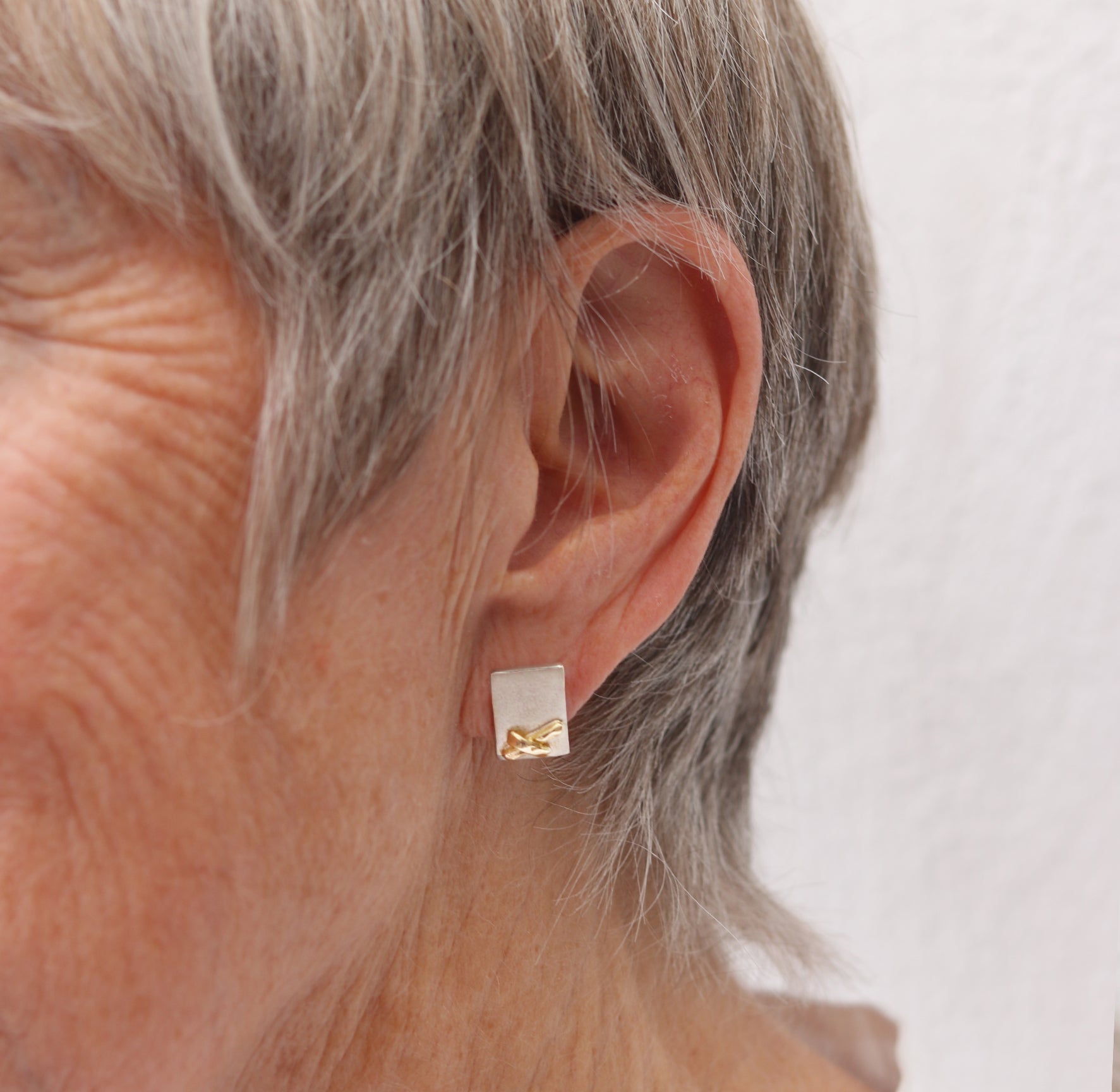 Silver and Yellow Gold Kiss Ear Studs