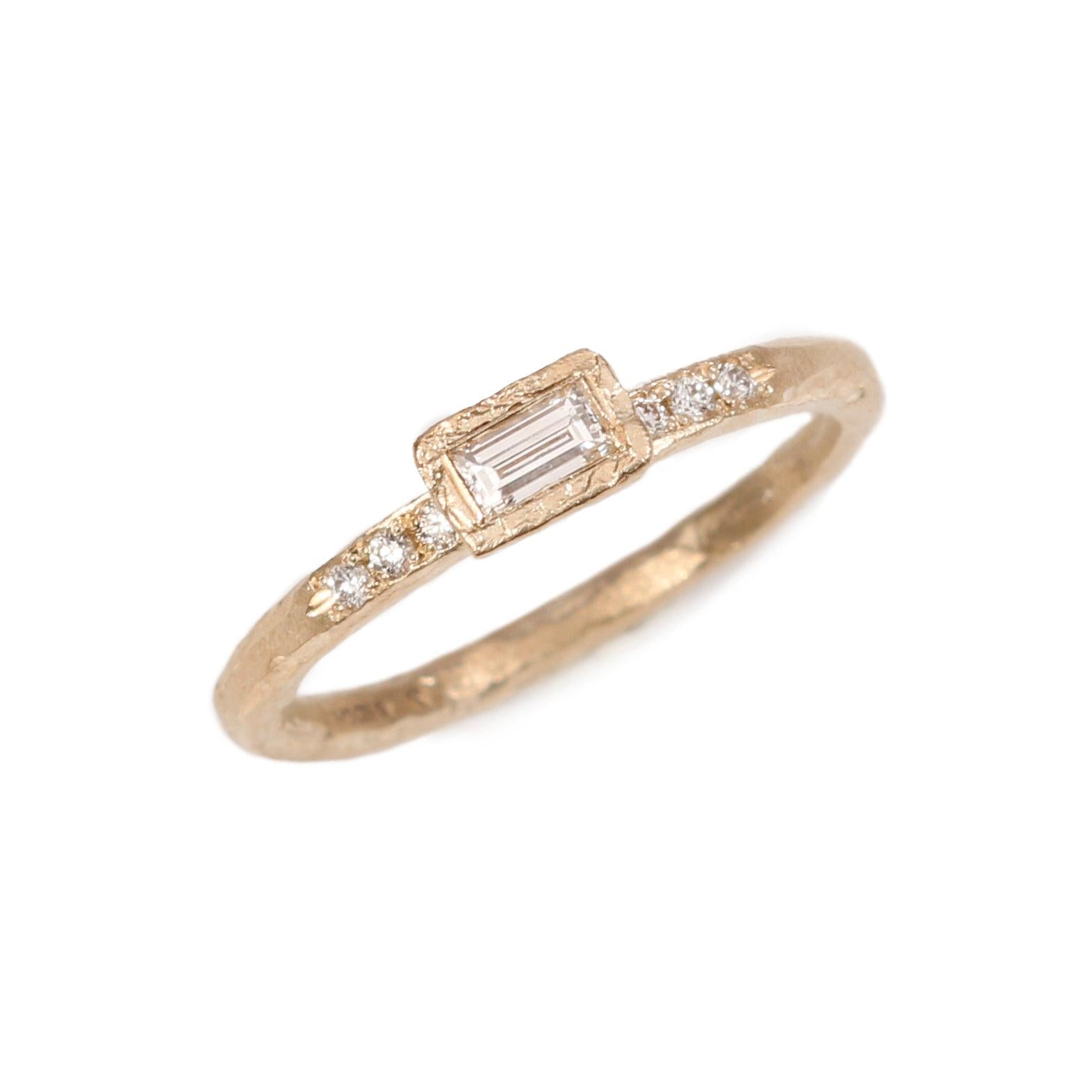 Yellow Gold Textured Ring with a Baguette and Round Diamonds