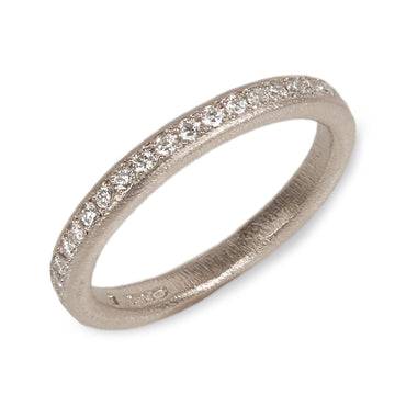 Modern White Gold Half Eternity Ring  on white background 