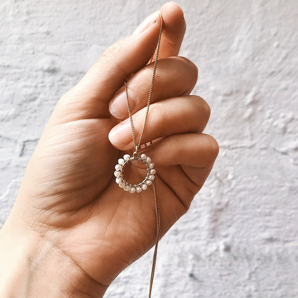 Mounir gold plated white pearl circle necklace