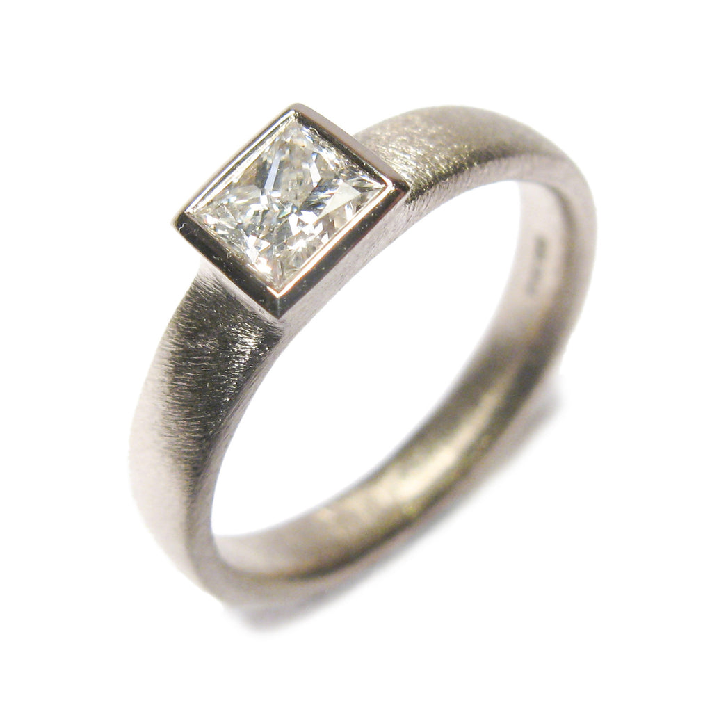 18ct White gold ring. Based on the AOJTNPC, adapted to take customers own princess cut diamond.