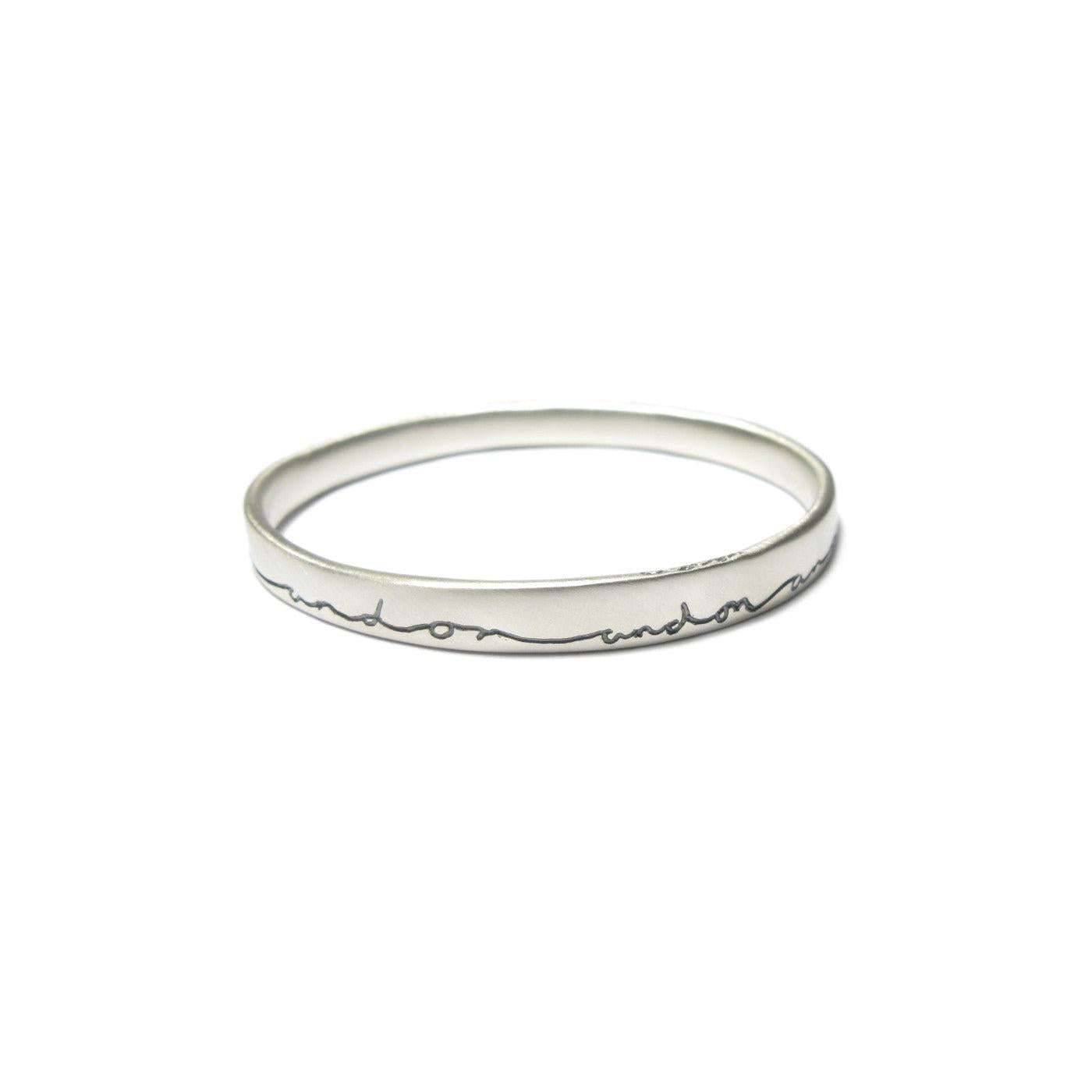 Diana Porter contemporary etched on and on silver bangle