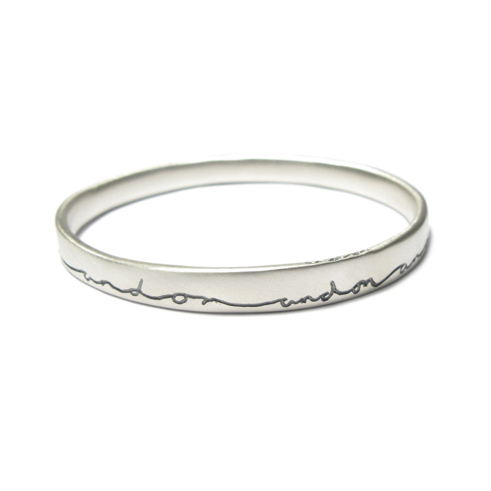 Diana Porter contemporary etched on and on silver bangle