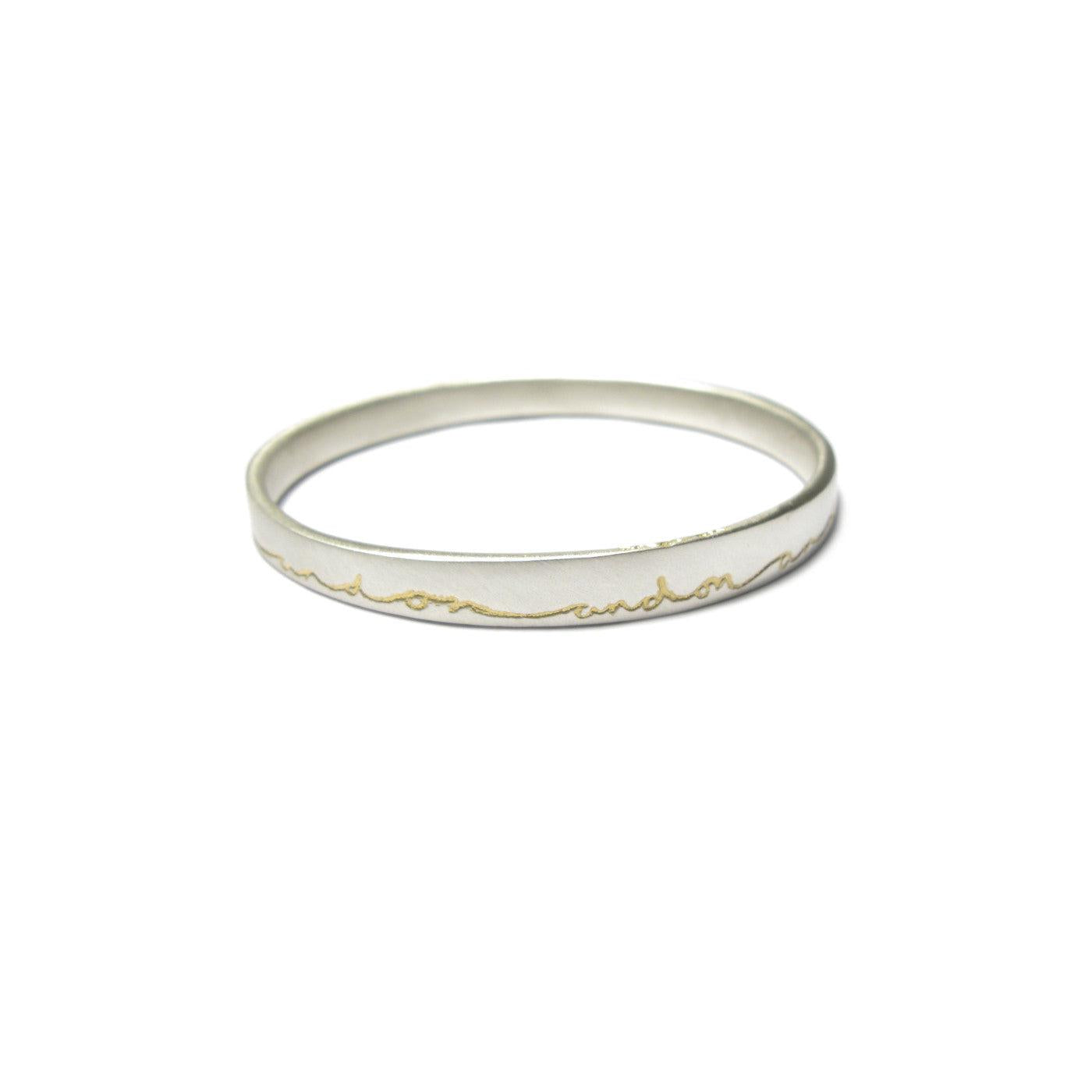 Diana Porter contemporary etched on and on silver gold bangle