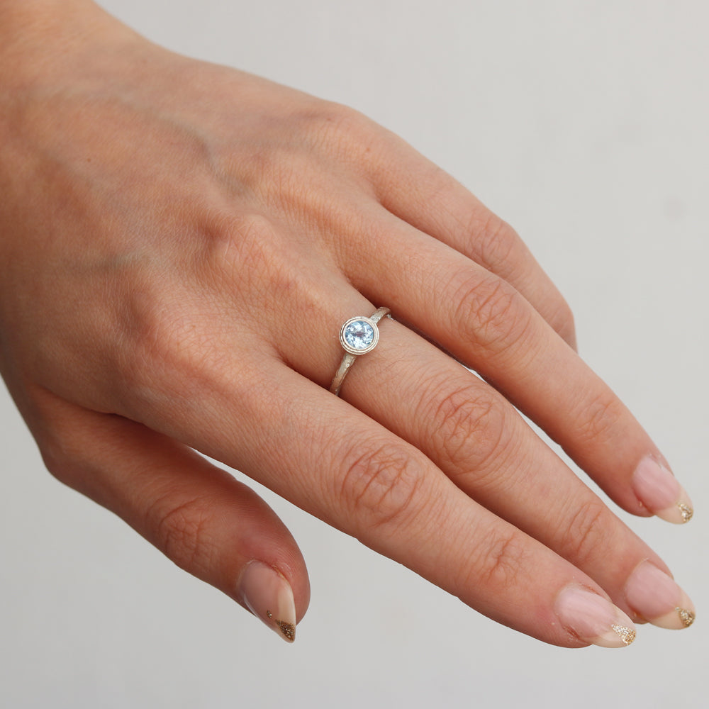 Aquamarine ring in etched 9ct Fairtrade white gold