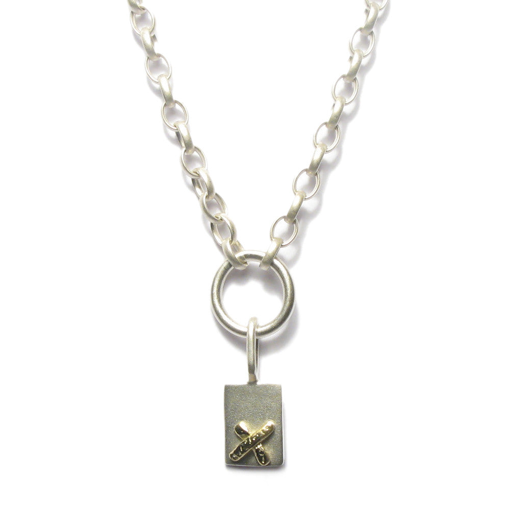 Diana Porter Jewellery contemporary silver gold kiss pendant necklace