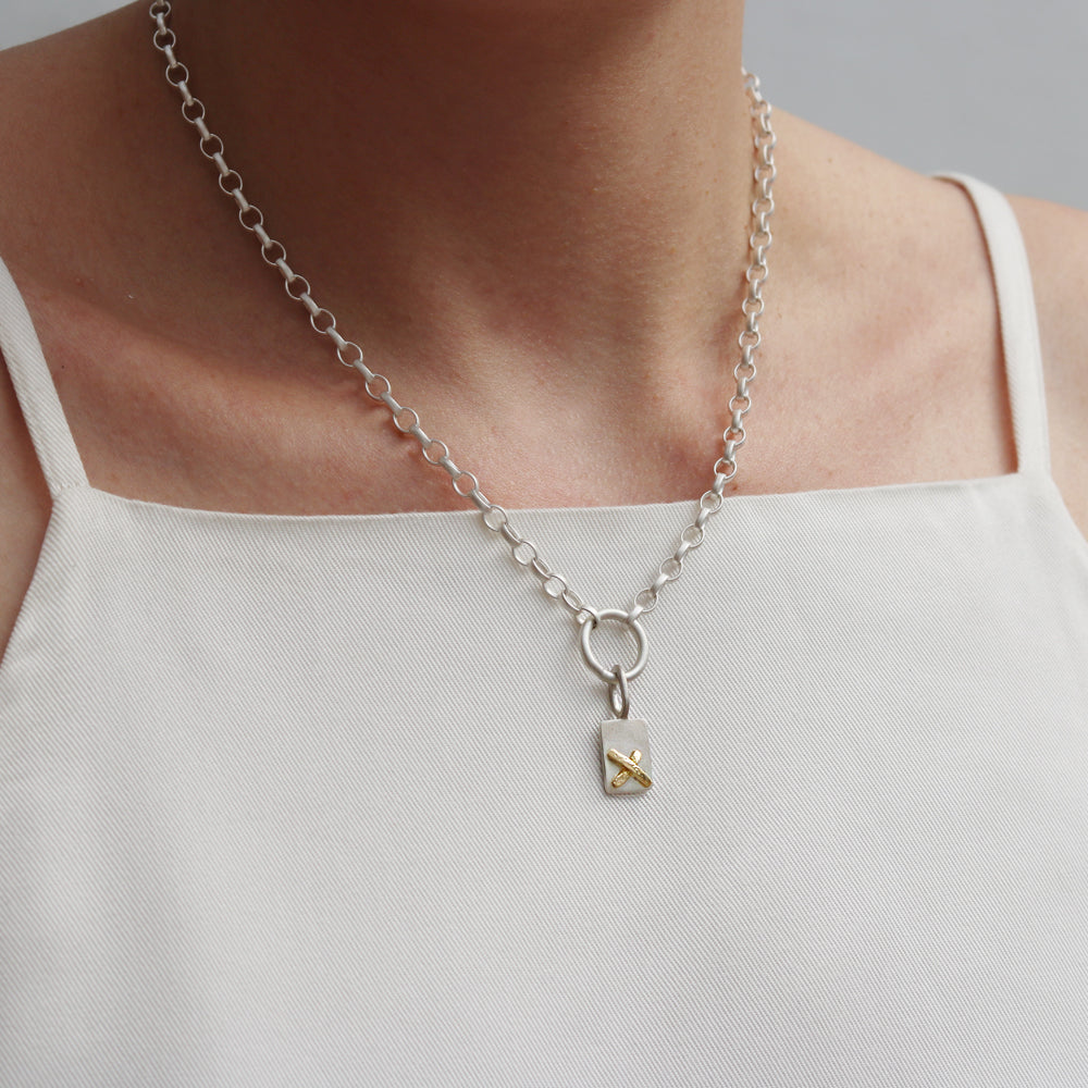 Silver and Gold Kiss Charm Necklace