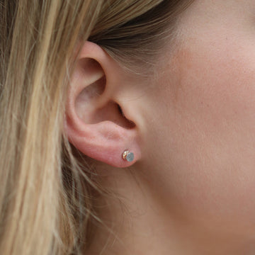Tiny 'and on' silver ear studs